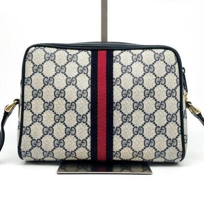 Authentic Gucci GG Supreme Navy Monogram Crossbody Sherry Canvas Shoulder Bag - The Reluxe