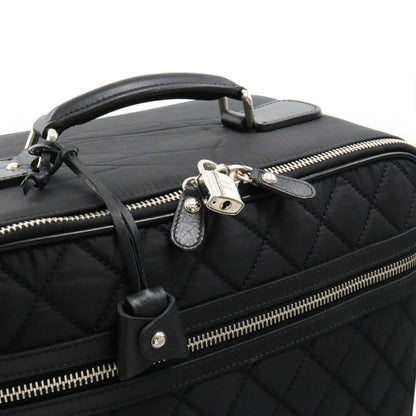 Authentic Pre - Owned CHANEL CC Quilted Nylon Luggage Carry - on Trolley Wheels Travel Bag - The Reluxe