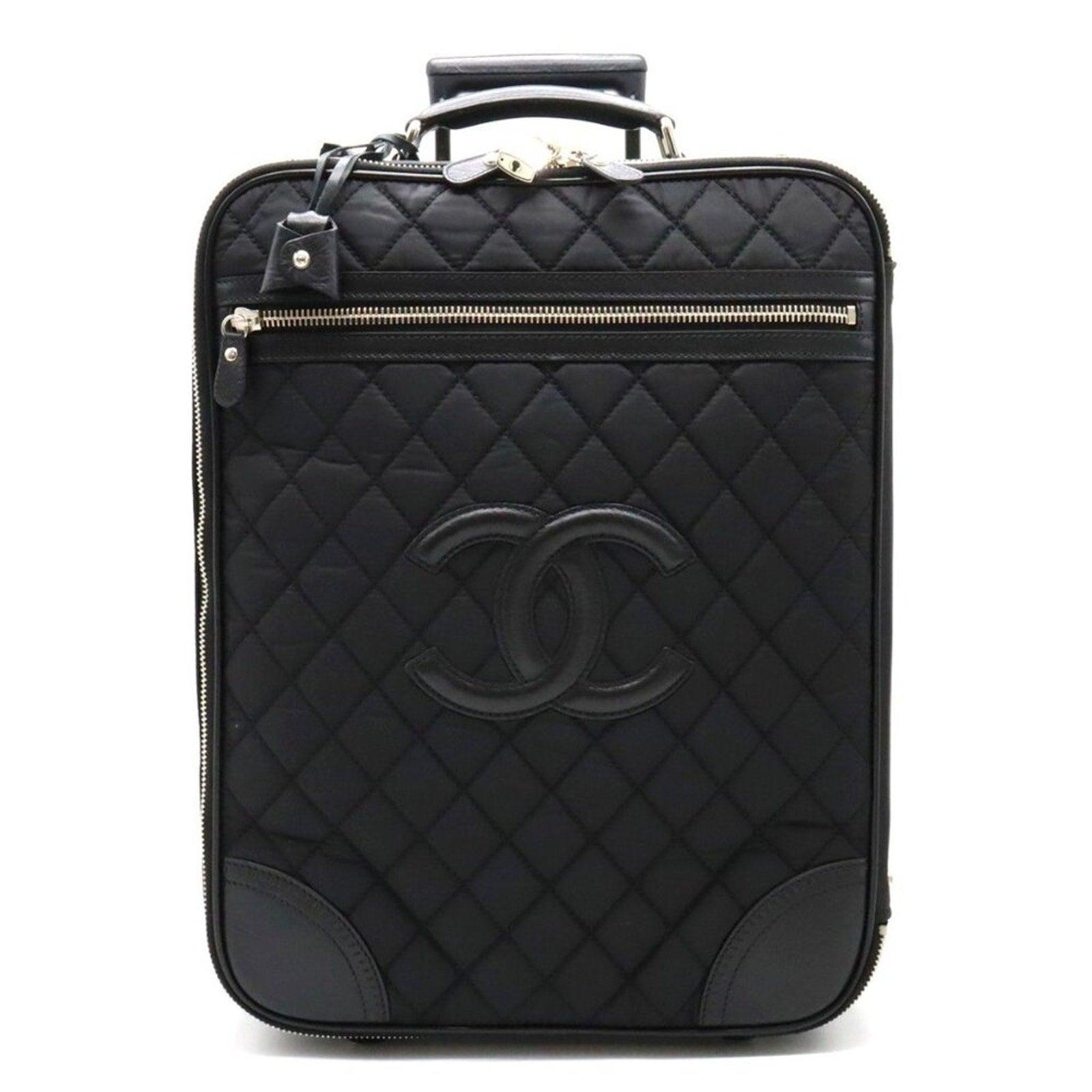 CHANEL CC Quilted Nylon Luggage Carry on Trolley Wheels Travel Bag The Reluxe Authentic Pre Owned Luxury Bags