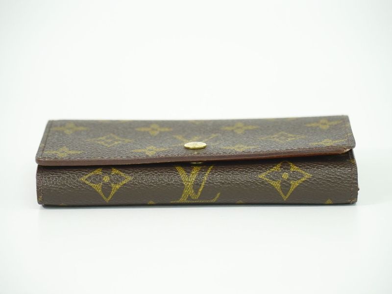 Authentic Louis Vuitton LV Porte Monet Vier Trésor Monogram Fold Wallet Brown