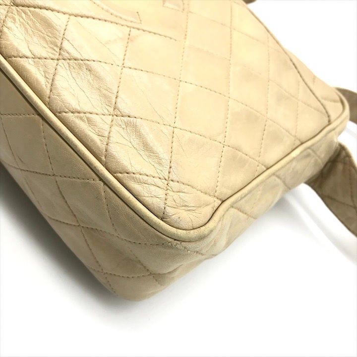 Chanel CC Logo Quilted Lambskin Fringe Shoulder Bag Beige Purse