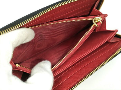 Prada Round Zipper Long Wallet Rose Saffiano Leather Black 1ml506