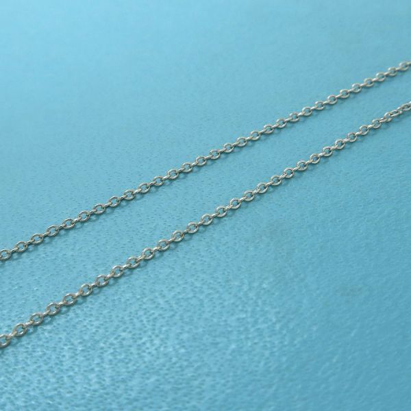 Tiffany & Co Diamond Dots Cross Necklace