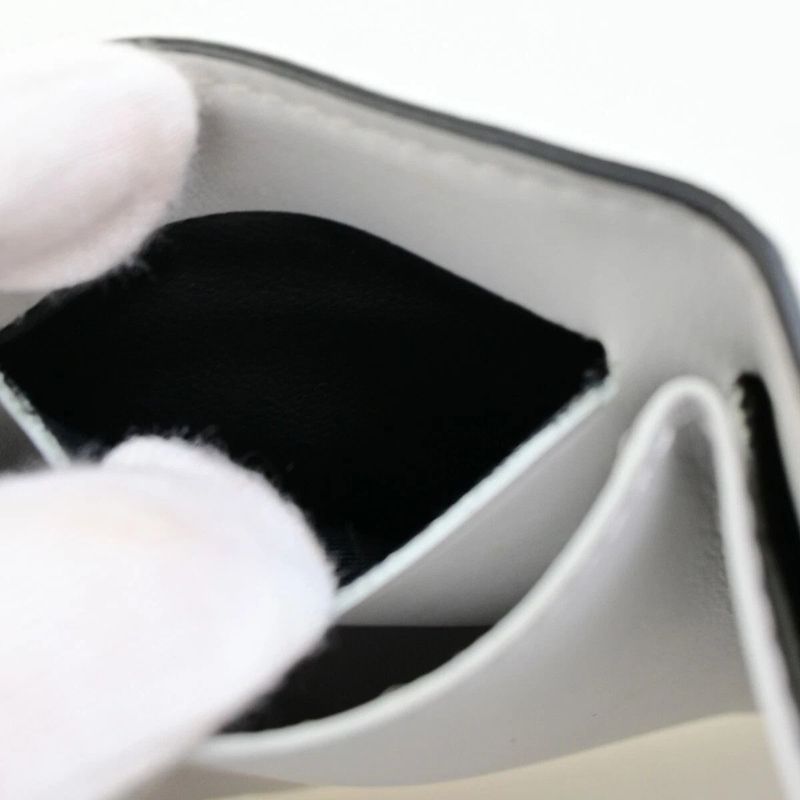 Louis Vuitton Trifold Wallet Taiga Llama Discovery Compact M67621 39fa050