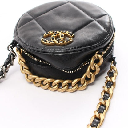 Chanel 19 Round Clutch With Chain Black Quilted Lambskin - The Reluxe