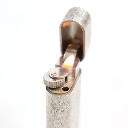 Cartier Allover Pattern Oval Form Roller Lighter Silver Swiss Made Men's