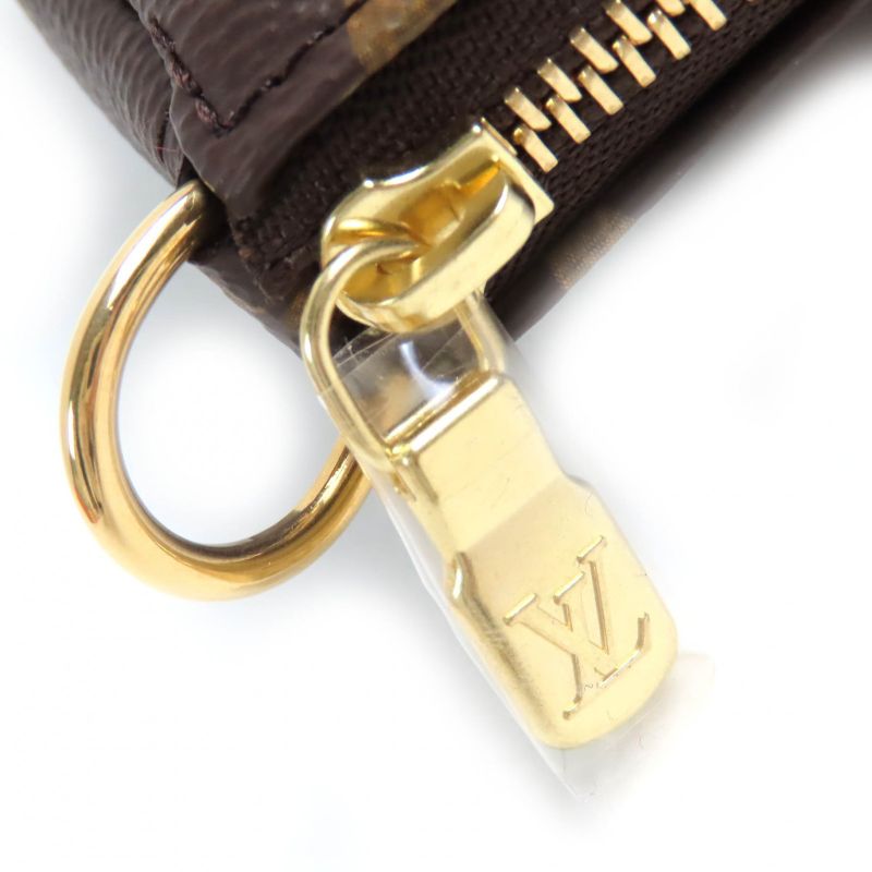 Louis Vuitton M58009 Mini Pochette Axessoire Monogram Canvas Nu Pouch Brown