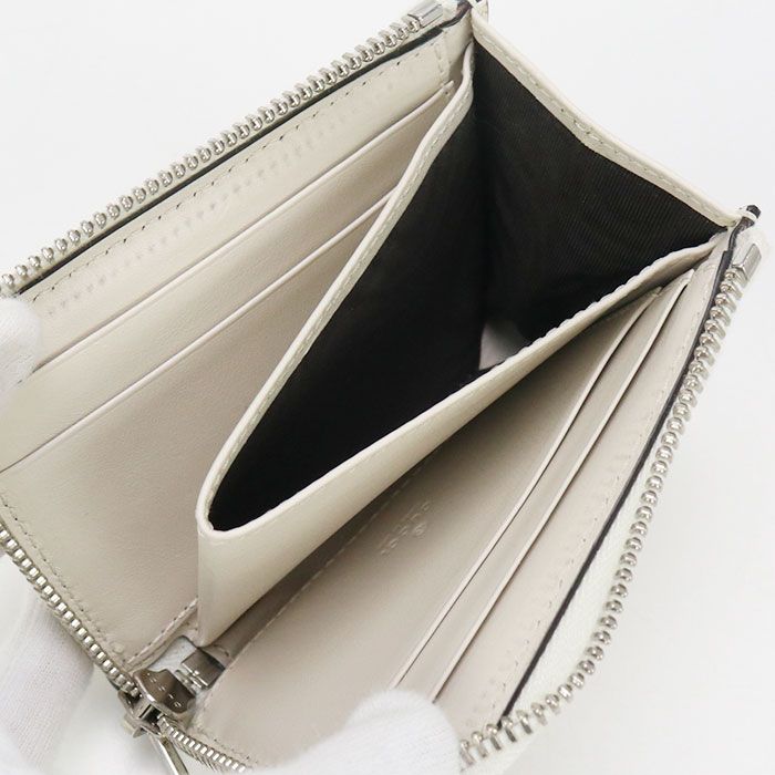 Gucci L Shaped Zipper Wallet GG Embossed 657571 Round Zipper Wallet Leather