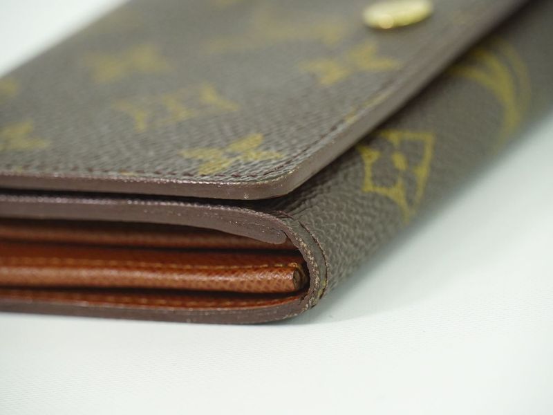 Authentic Louis Vuitton LV Porte Monet Vier Trésor Monogram Fold Wallet Brown