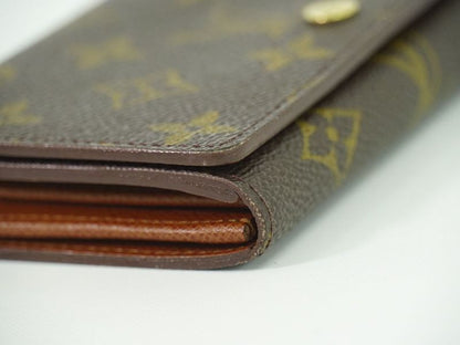 Authentic Louis Vuitton LV Porte Monet Vier Trésor Monogram Fold Wallet Brown