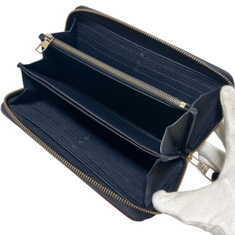 Louis Vuitton Empreinte Leather Zippy Wallet Navy Embossed Monogram Pattern