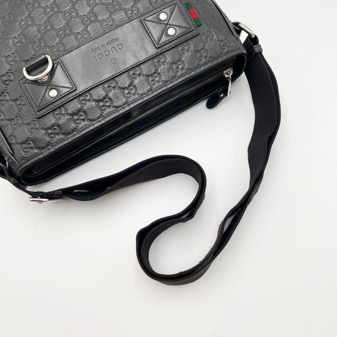 Gucci GG Messenger Bag Guccissima Rubber Shoulder Bag Black Leather - The Reluxe