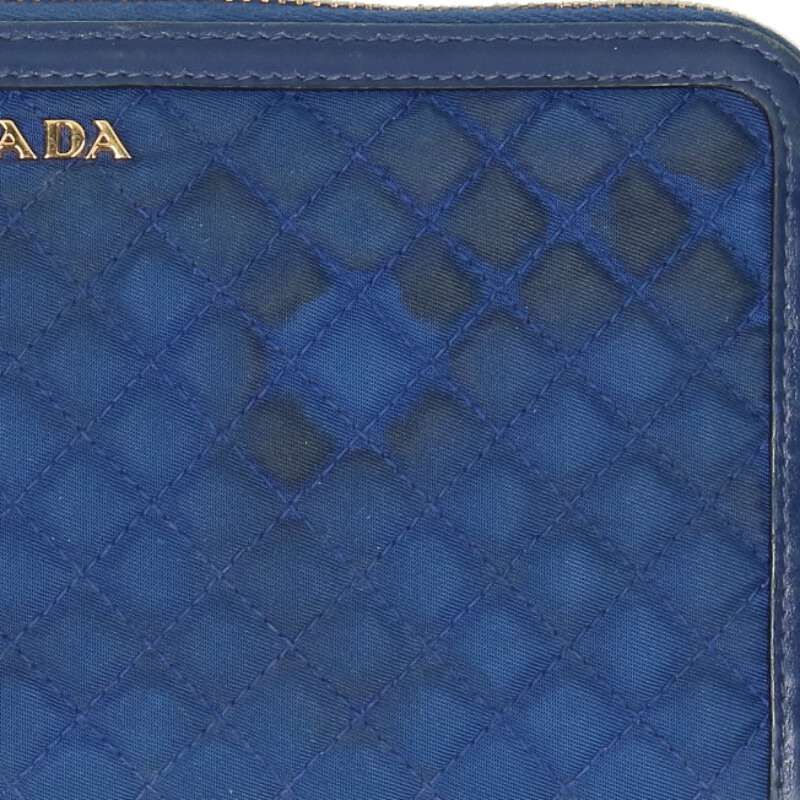 Prada 1m0506 Quilted Round Zip Wallet For Women