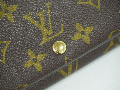 Authentic Louis Vuitton LV Porte Monet Vier Trésor Monogram Fold Wallet Brown