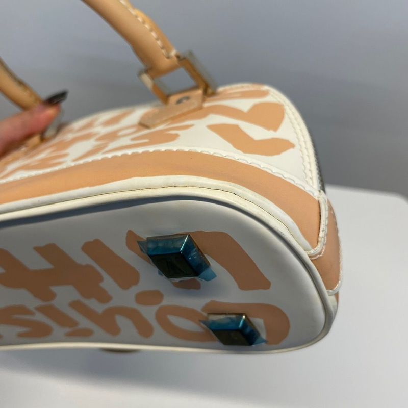 Louis Vuitton Alma Oriental Handbag
