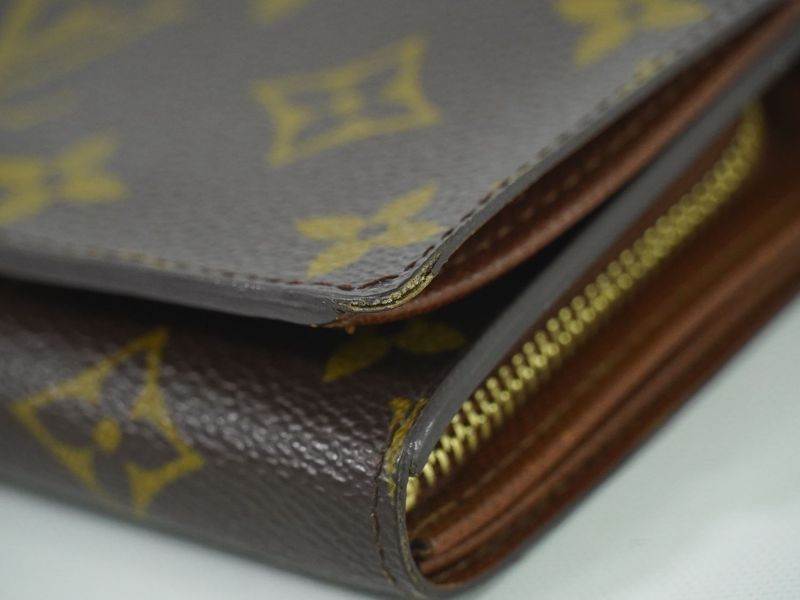 Authentic Louis Vuitton LV Porte Monet Vier Trésor Monogram Fold Wallet Brown