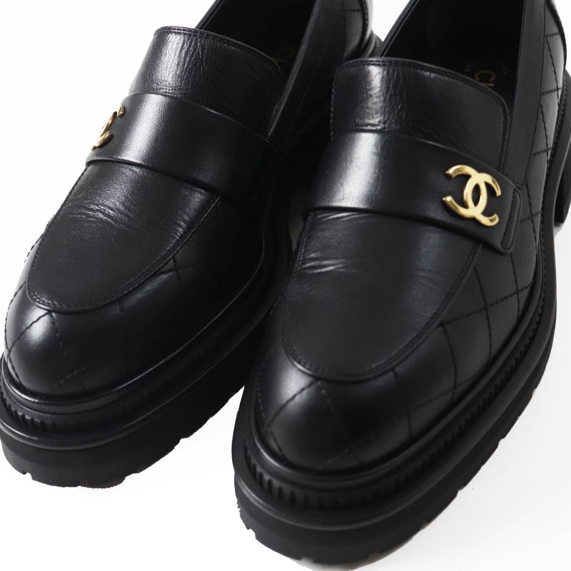 CHANEL 23A G45074 Matelasse Coco Mark Leather Loafers Black Gold Hardware 39.5