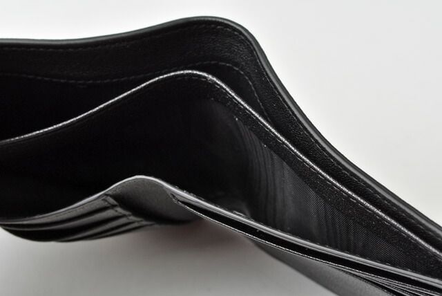 Saint Laurent Wallet YSL Saint Laurent Men's Foldable Wallet Star Leather Black