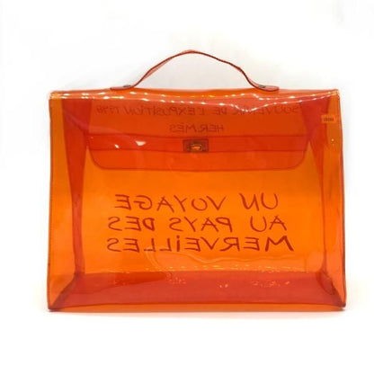 Hermes Vinyl Kelly Clear Handbag Orange
