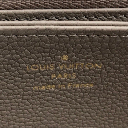 Louis Vuitton Empreinte Zippy Wallet Beige