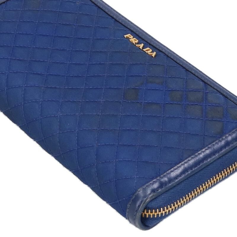 Prada 1m0506 Quilted Round Zip Wallet For Women