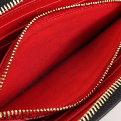 Authentic Christian Louboutin Calfskin Panettone Spiked Zip Around Wallet Black