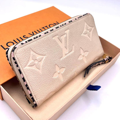 Louis Vuitton Monogram Empreinte Wild at Wallet Beige — view 2