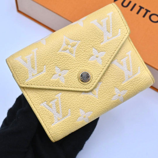 Louis Vuitton Monogram Empreinte Bicolor Victorine Yellow Wallet