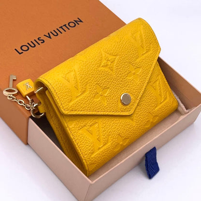 Louis Vuitton Empreinte Victorine Trifold Wallet Yellow