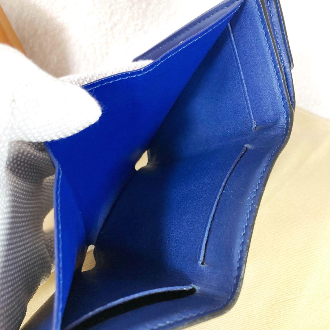 Louis Vuitton Discovery Taiga Llama Compact Trifold Wallet