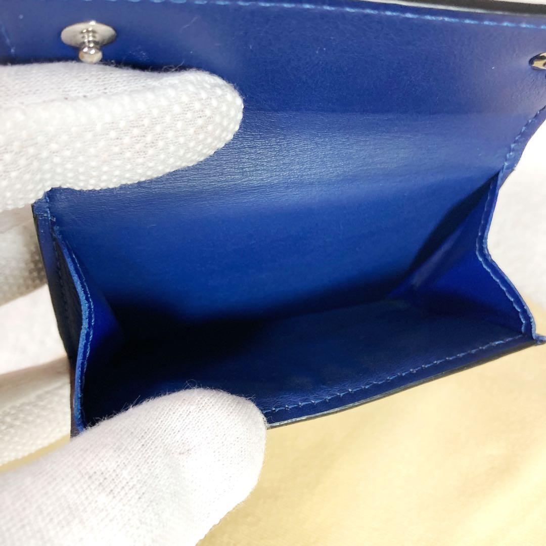 Louis Vuitton Discovery Taiga Llama Compact Trifold Wallet