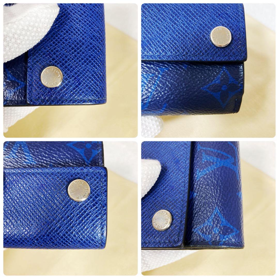 Louis Vuitton Discovery Taiga Llama Compact Trifold Wallet