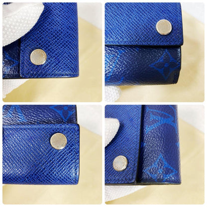 Louis Vuitton Discovery Taiga Llama Compact Trifold Wallet