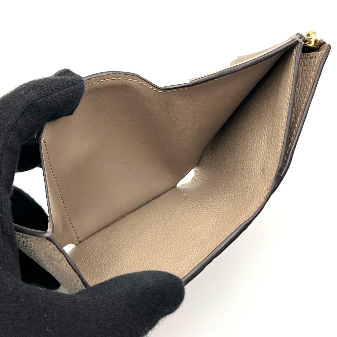Louis Vuitton Monogram Empreinte Zoe Trifold Wallet Tourterelle