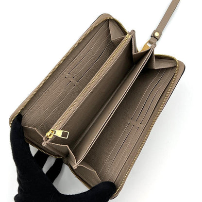 Louis Vuitton Empreinte Wallet Zippy Beige — view 3