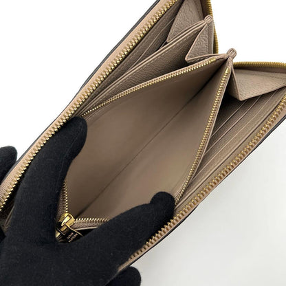 Louis Vuitton Empreinte Wallet Zippy Beige — view 4