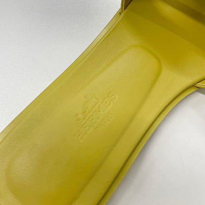 Hermes Oran Leather Flat Sandals Yellow — view 7