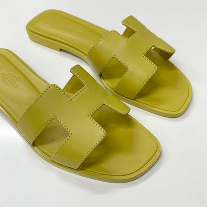 Hermes Oran Leather Flat Sandals Yellow — view 9