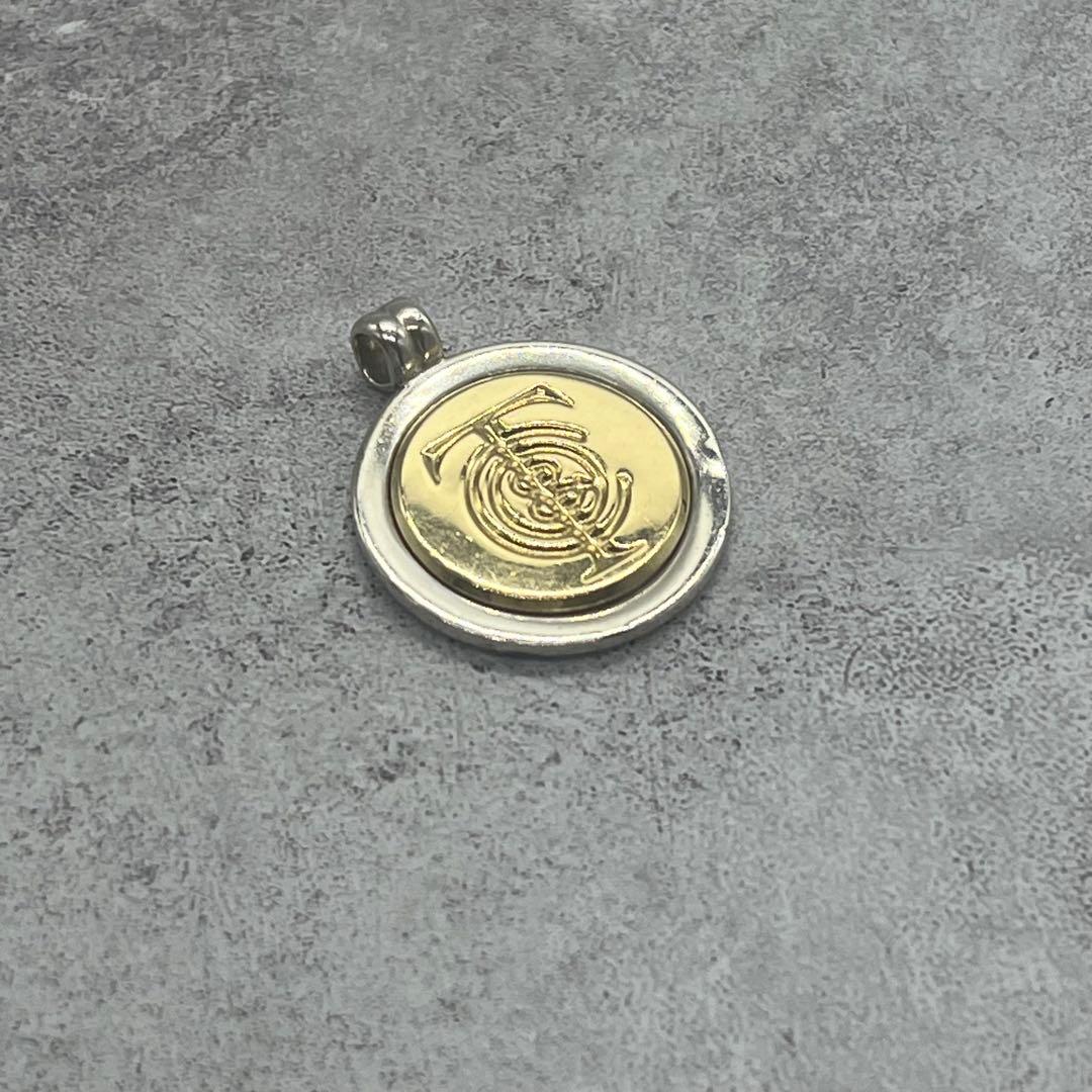 Tiffany & Co Vintage Logo Coin Pendant