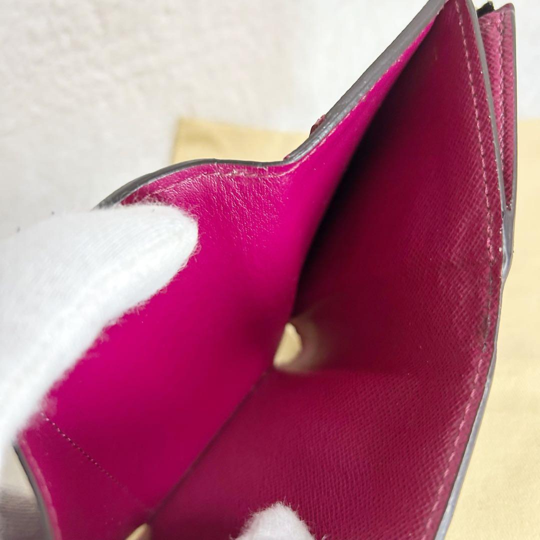 Louis Vuitton Portefeuille Zoe Fuchsia Trifold Wallet