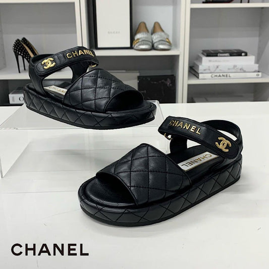 Chanel CC Logo Quilted Leather Flat Sandals Black