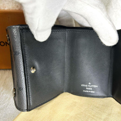 Louis Vuitton Discovery Eclipse Monogram Reverse Trifold Wallet