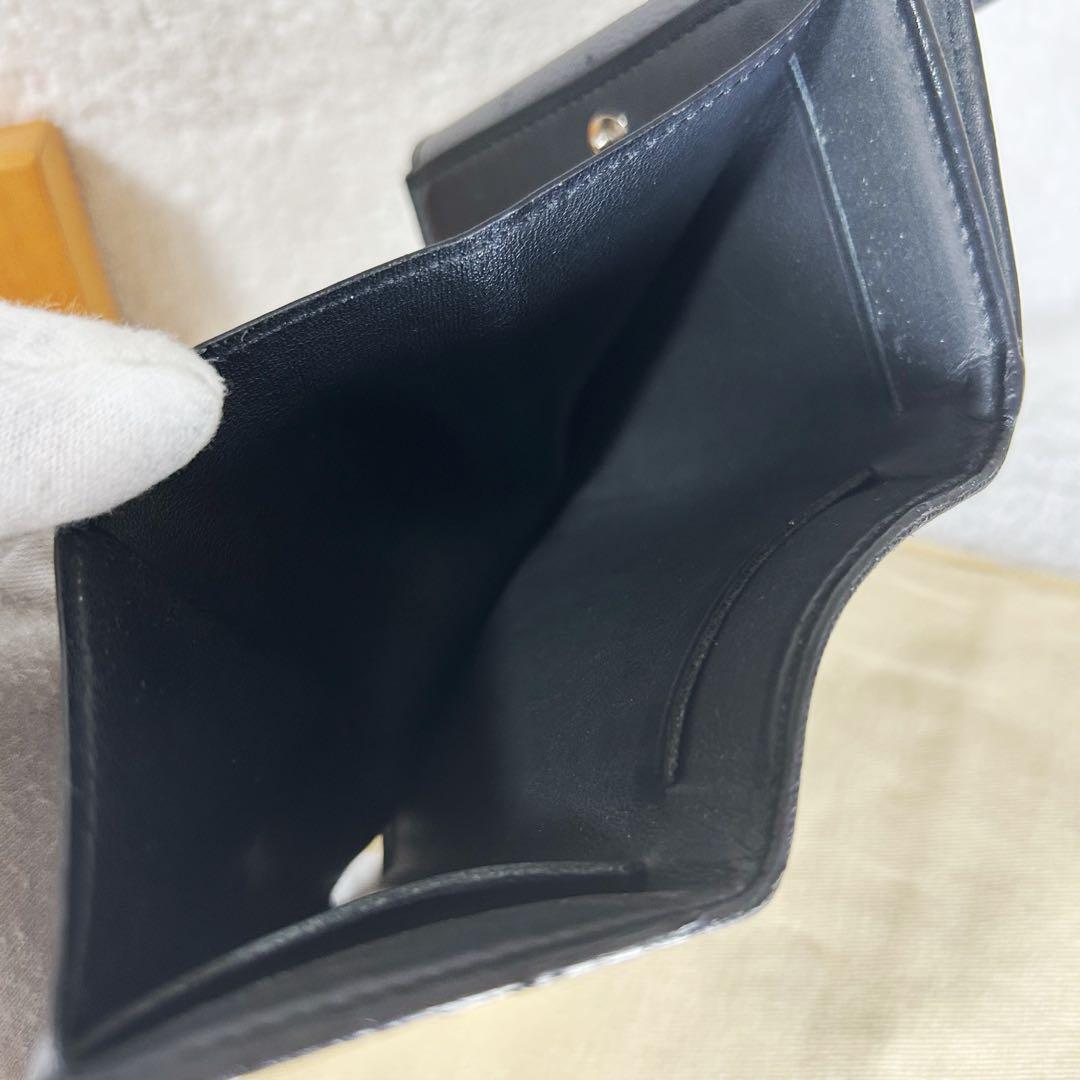 Louis Vuitton Discovery Eclipse Monogram Reverse Trifold Wallet