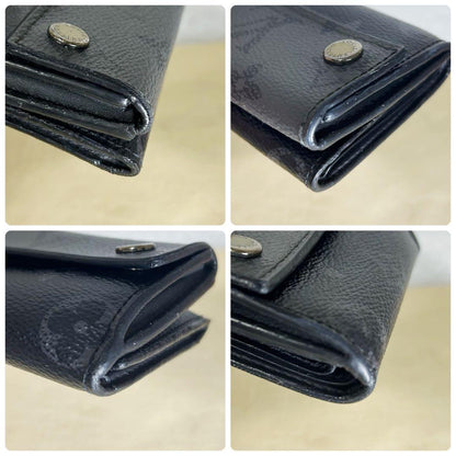 Louis Vuitton Discovery Eclipse Monogram Reverse Trifold Wallet
