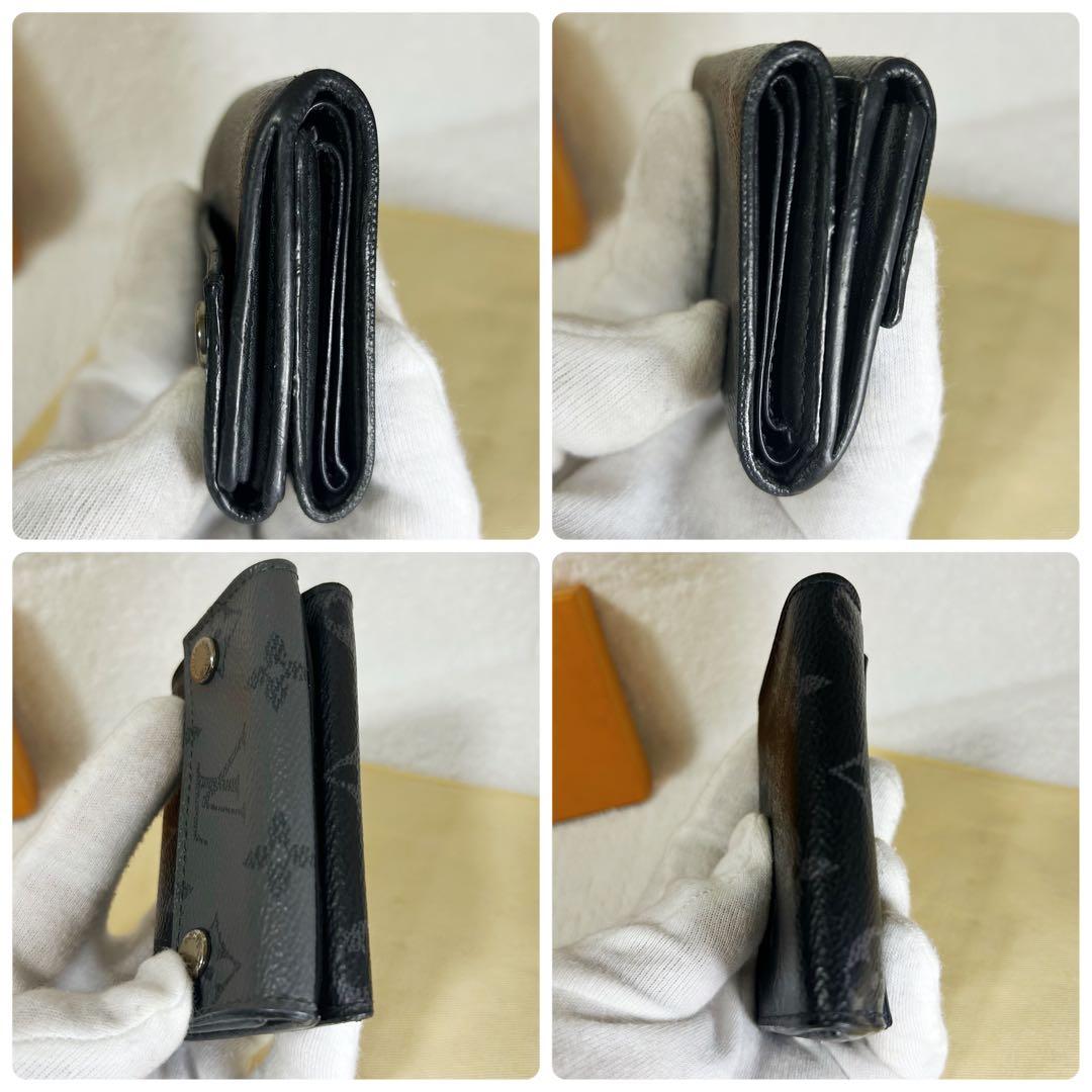 Louis Vuitton Discovery Eclipse Monogram Reverse Trifold Wallet