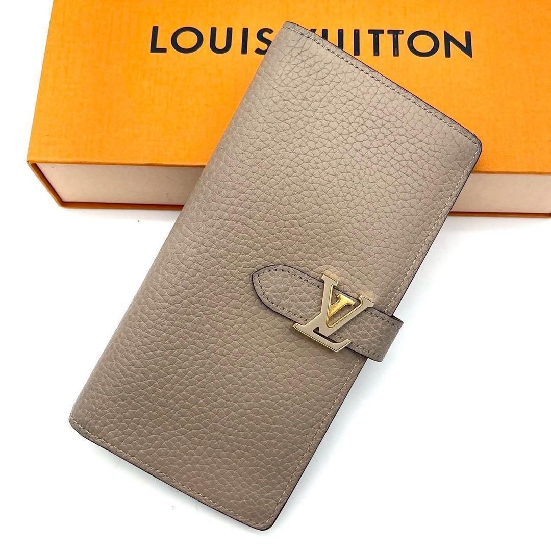 Louis Vuitton Taurillon LV Vertical Wallet Gale Bifold