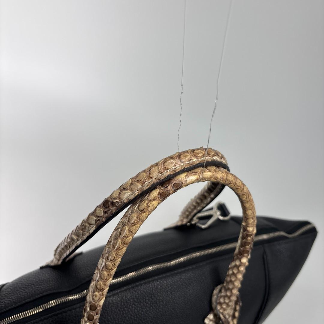 Louis Vuitton Taurillon Lockit MM Handbag — view 6