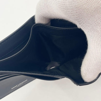 Saint Laurent By Anthony Vaccarello YSL Embossed Folded Wallet