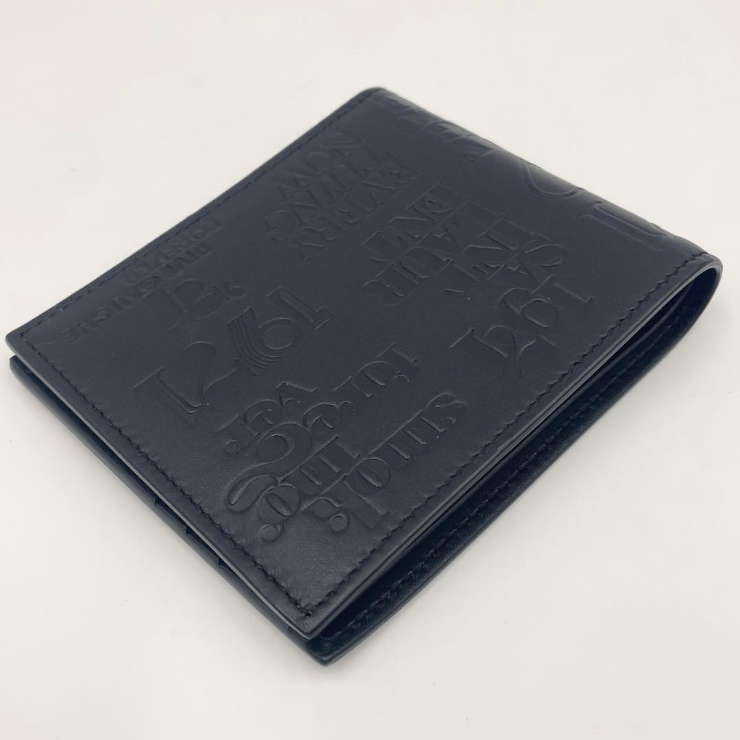 Saint Laurent By Anthony Vaccarello YSL Embossed Folded Wallet