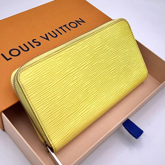 Louis Vuitton Epi Wallet Yellow Newshape Leather